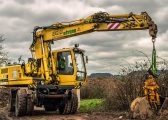 Excavator on land with potential restrictive covenants