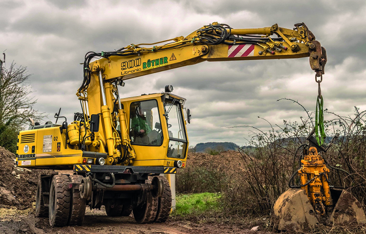 Excavator on land with potential restrictive covenants