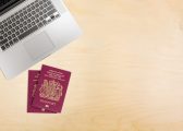 Desk with laptop and UK passports for Right to work