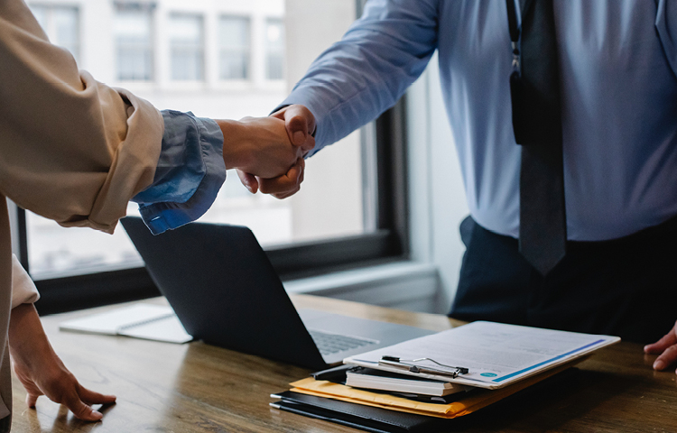 Fixed Fee Employment advice two people shaking hands