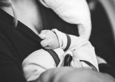Breastfeeding facility blog image of woman holding a baby