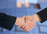 man and woman shaking hands for Limited Company vs Partnership blog
