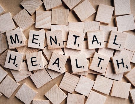 Mental Health in the Workplace blog image of wooden blocks spelling out mental health