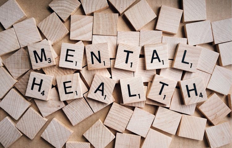 Mental Health in the Workplace blog image of wooden blocks spelling out mental health