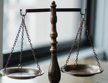 Picture of the scales of justice to represent changes to legislation for the The UK's New Statutory Duty on Employers to Prevent Sexual Harassment