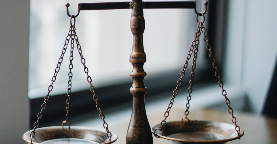 Picture of the scales of justice to represent changes to legislation for the The UK's New Statutory Duty on Employers to Prevent Sexual Harassment