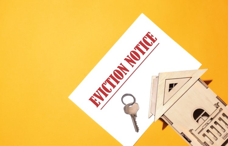 Image of a eviction notice with a house and house key for the Renters Rights Blog